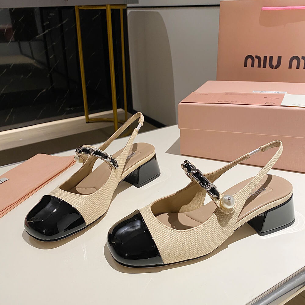 M1um1u Patent leather and raffia slingback pumps