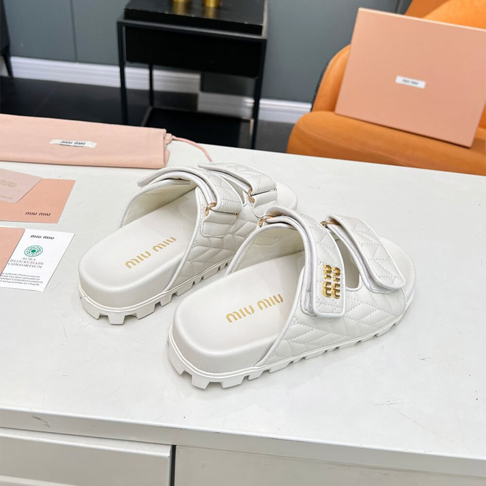 M1um1u Matelass?? nappa leather slides