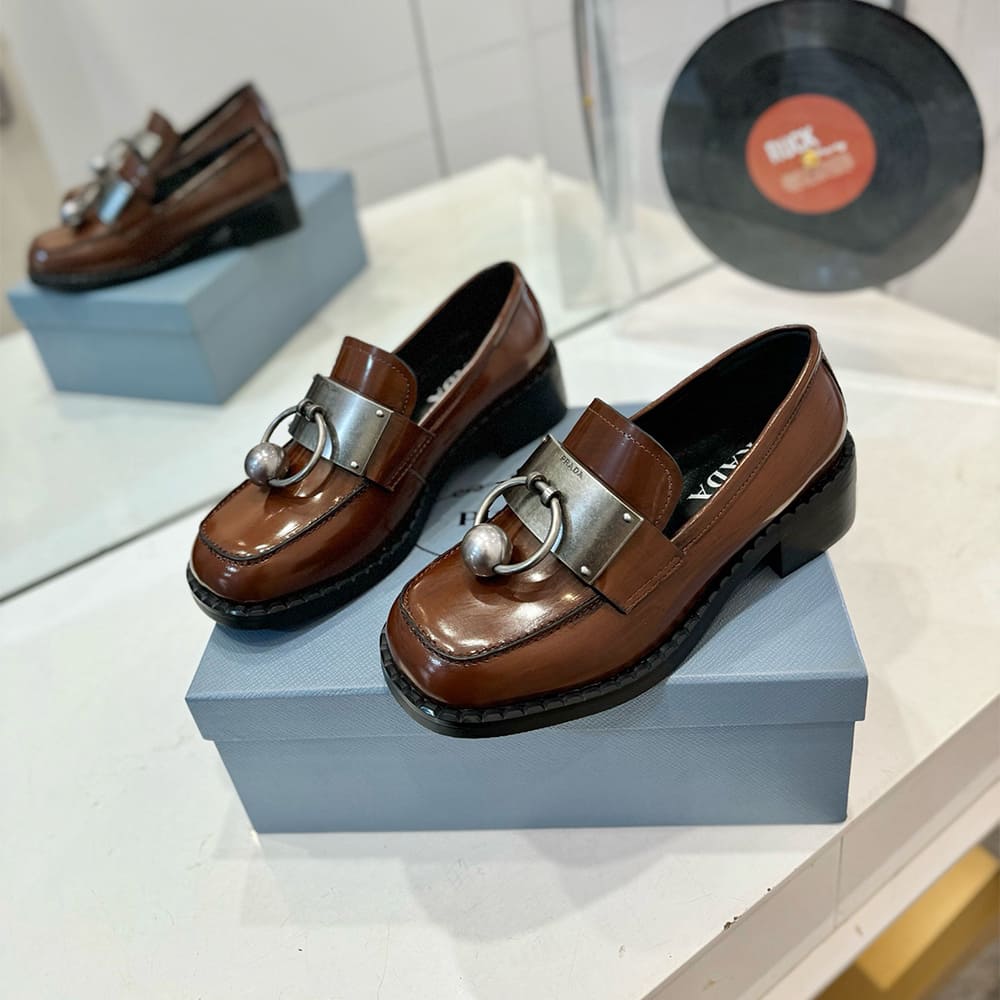 Pra*a Brushed leather loafers with metal details