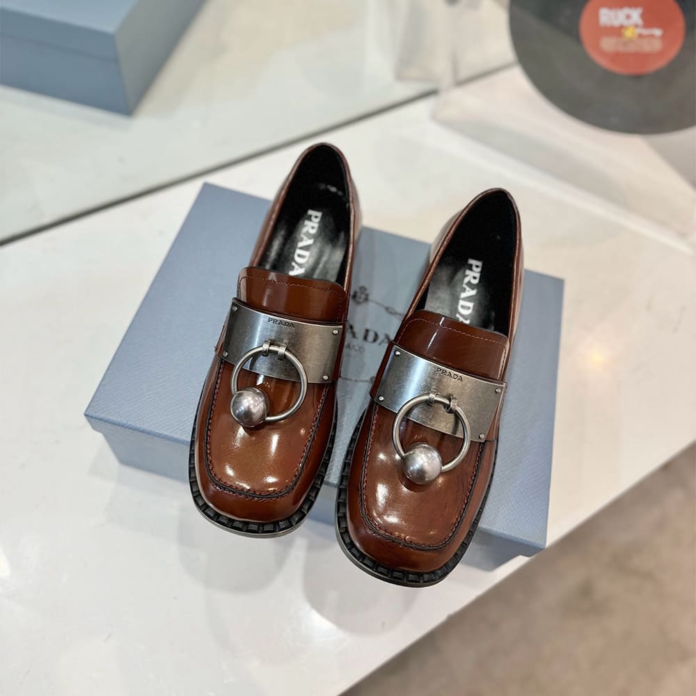 Pra*a Brushed leather loafers with metal details