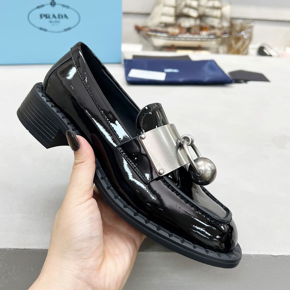 Pra*a Brushed leather loafers with metal details