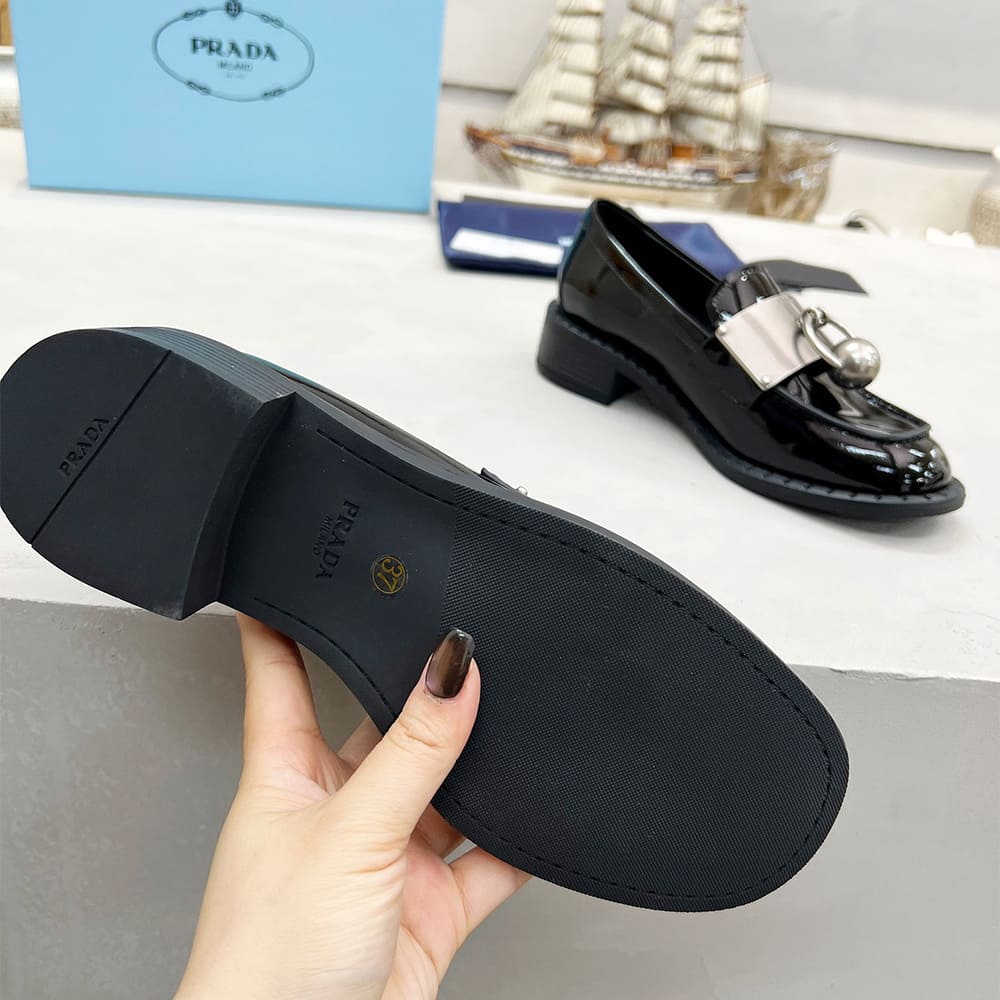 Pra*a Brushed leather loafers with metal details