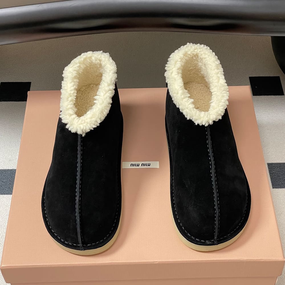 M1um1u Suede and shearling slip-on booties