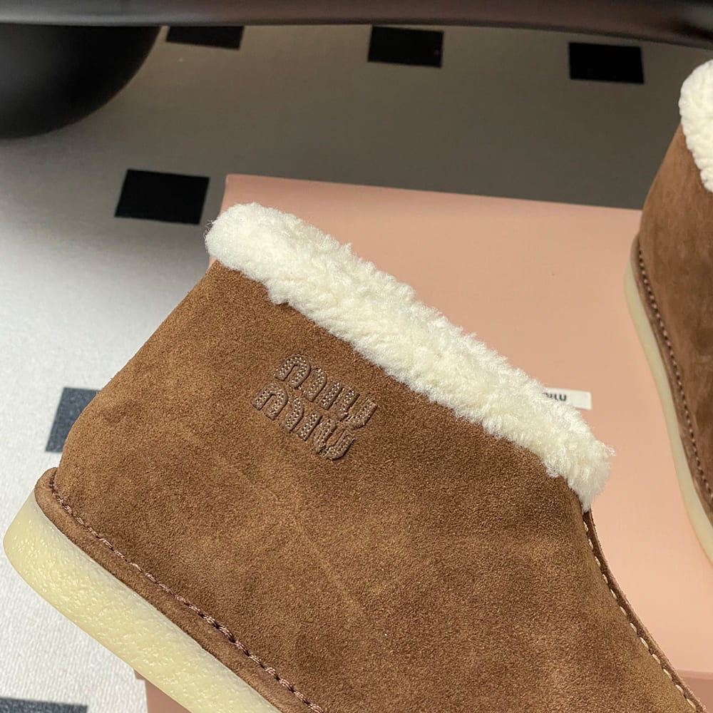 M1um1u Suede and shearling slip-on booties