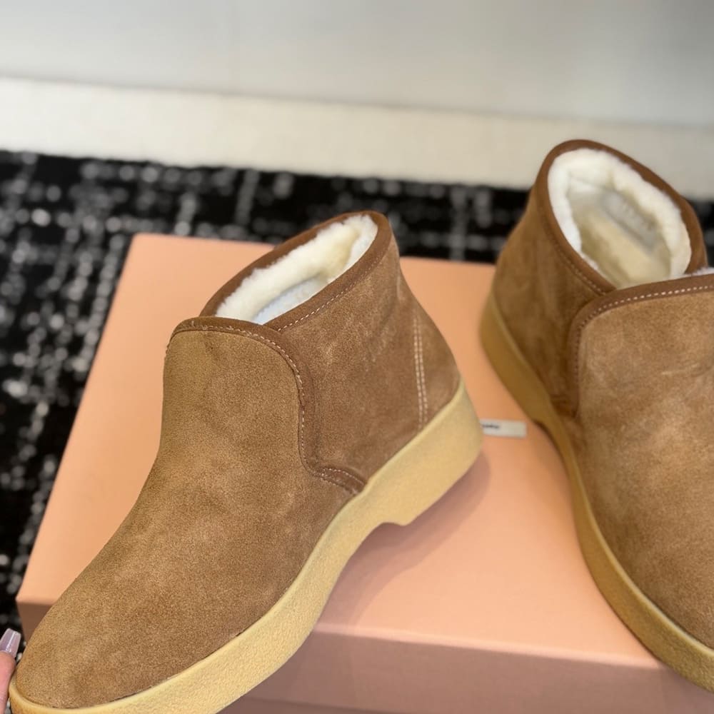 M1um1u Suede and shearling slip-on booties