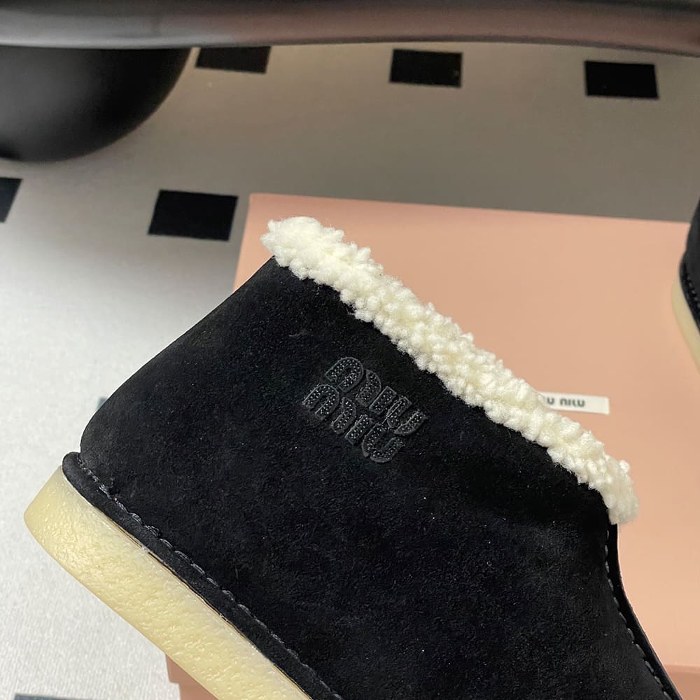 M1um1u Suede and shearling slip-on booties