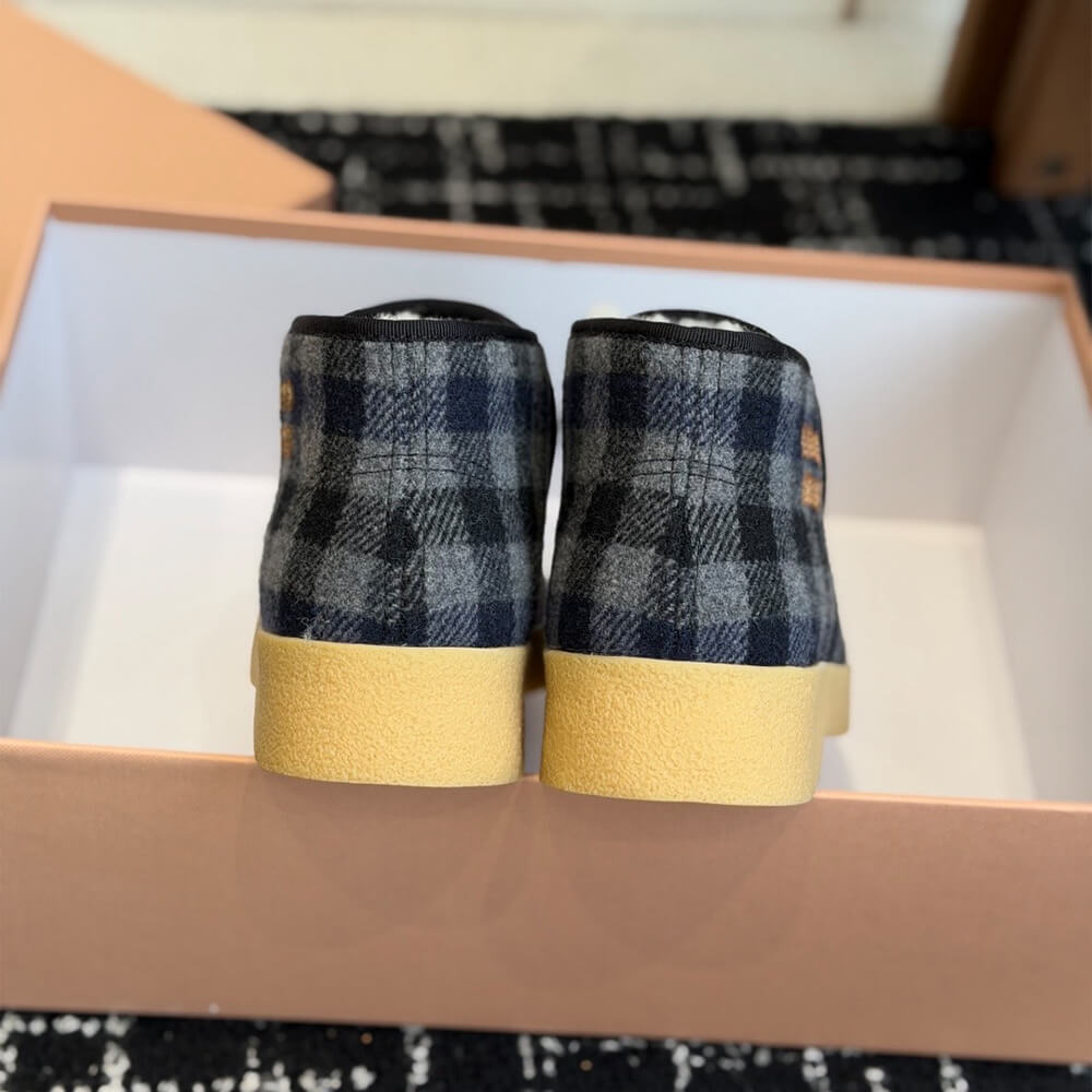 M1um1u Wool and shearling slip-on booties