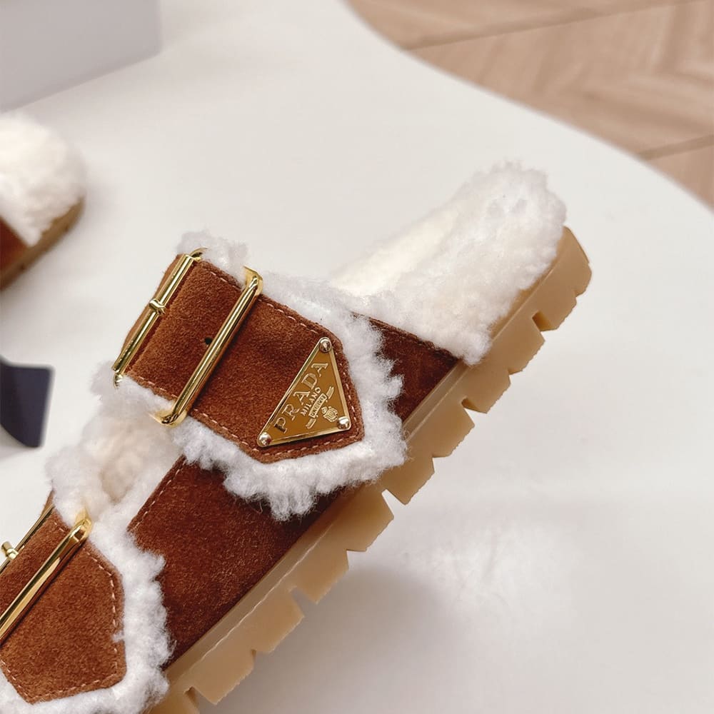 Pra*a Suede and shearling slides