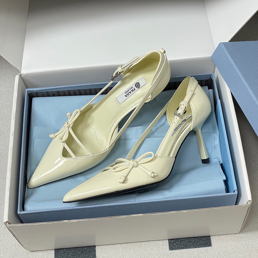Pra*a Open-side leather pumps