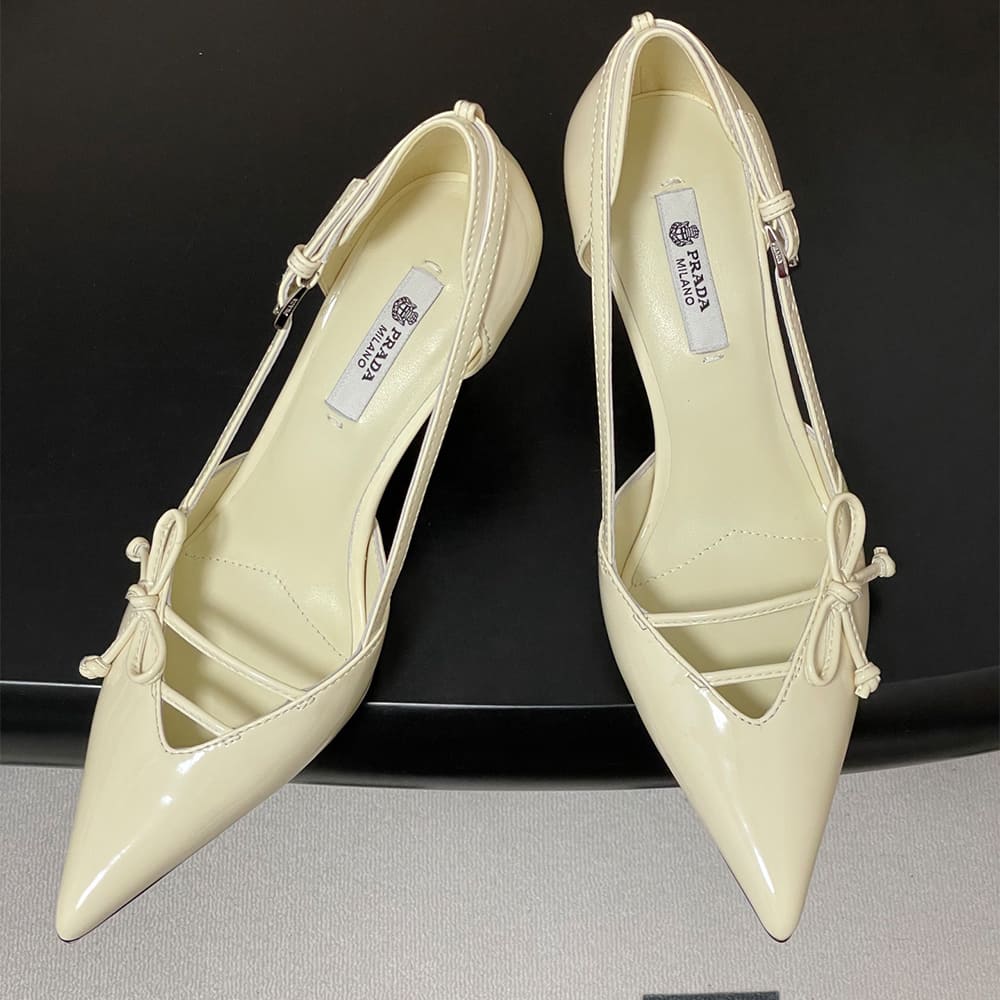 Pra*a Open-side leather pumps