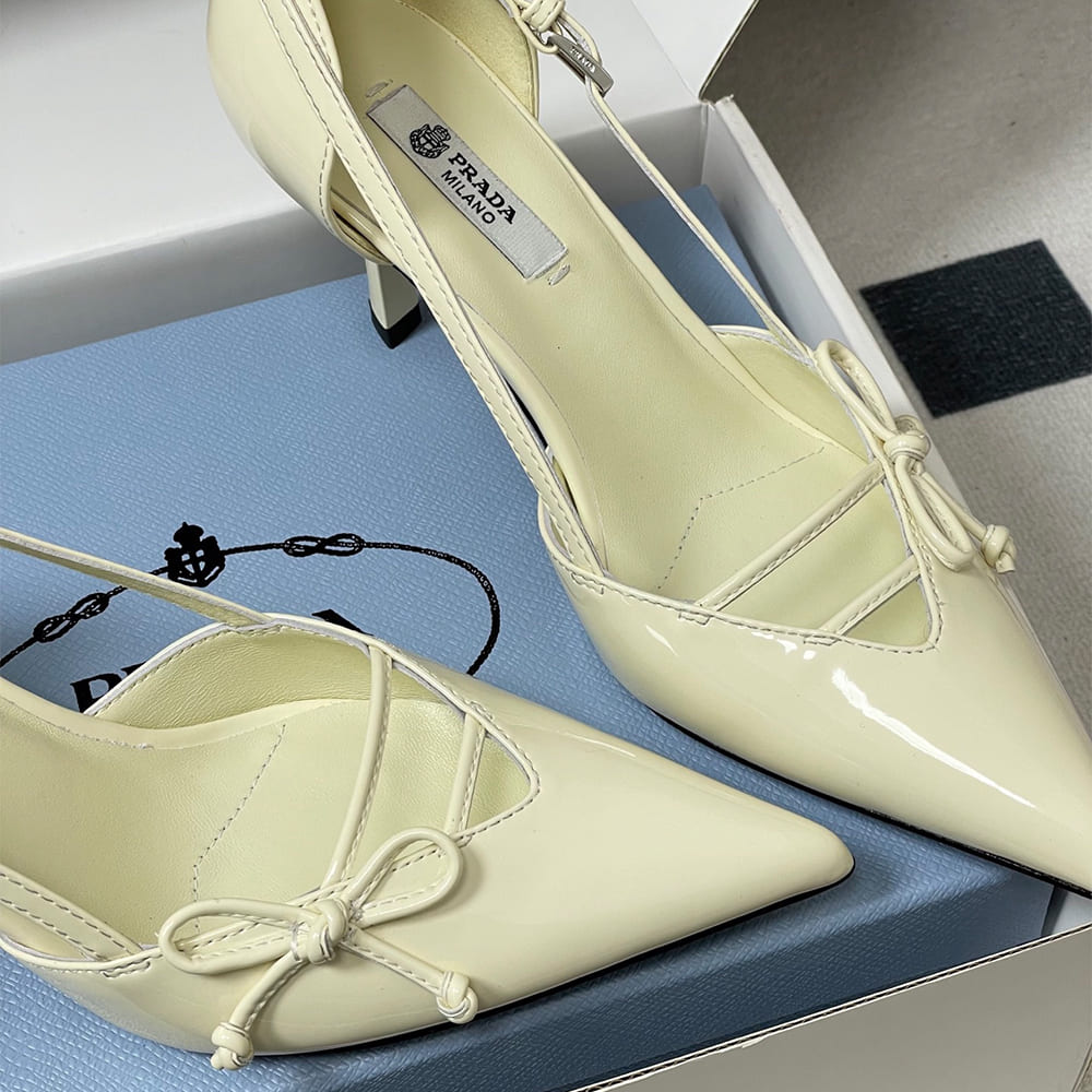 Pra*a Open-side leather pumps