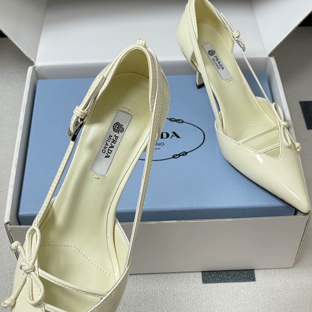 Pra*a Open-side leather pumps