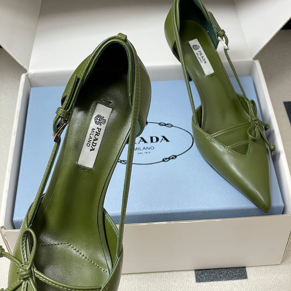 Pra*a Open-side leather pumps