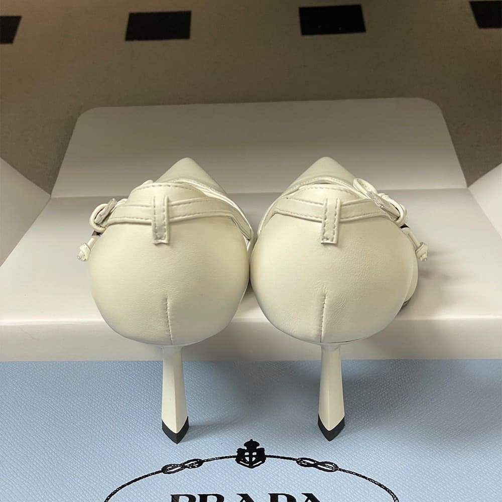 Pra*a Open-side leather pumps