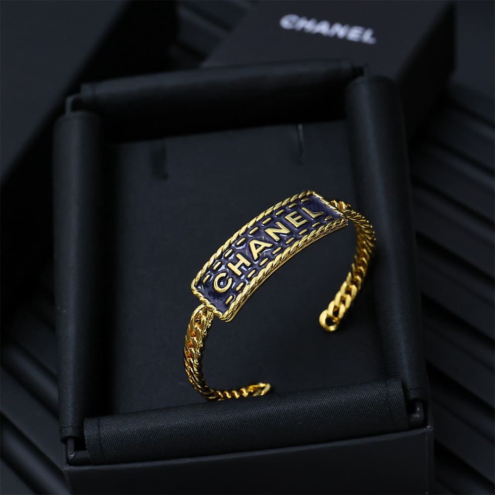 Ch**el Wide Gold Metal Bracelet