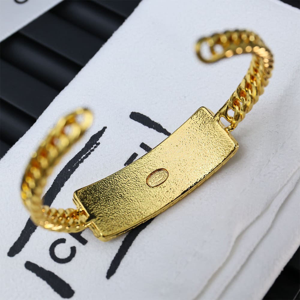 Ch**el Wide Gold Metal Bracelet