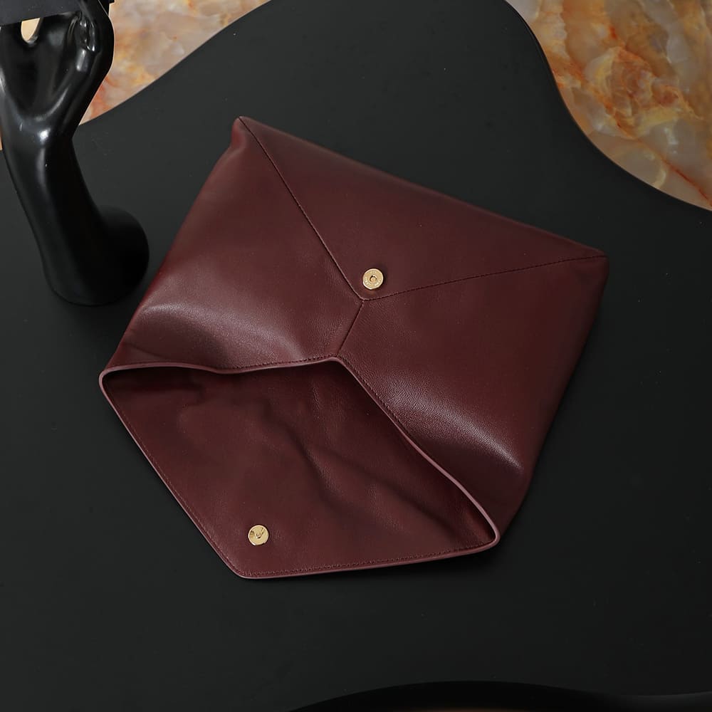 Y51 CASSANDRE large envelope pouch in shiny leather